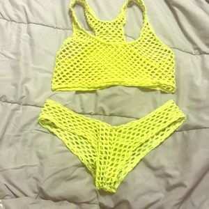 Neon yellow fishnet outfit